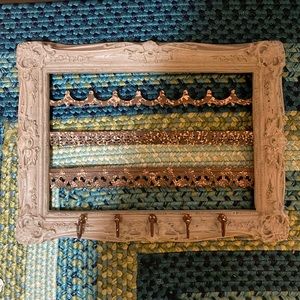 Key holder!Can hang keys,hats,umbrellas. would hang my masks on it during covid.